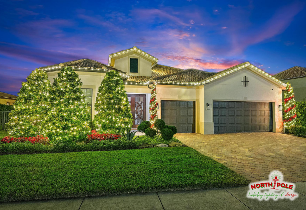 Residential holiday lighting in Palm Beach Gardens with warm white LED candy cane tree wraps.