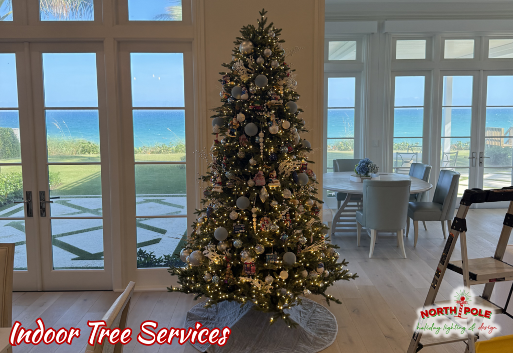 Professional indoor Christmas tree decorating service in a luxury Boca Raton home featuring gold and silver ornaments.